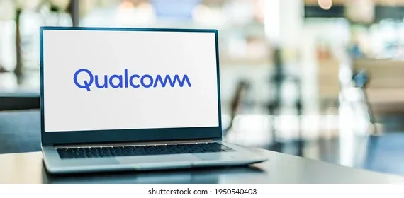 Qualcomm website interface on laptop.