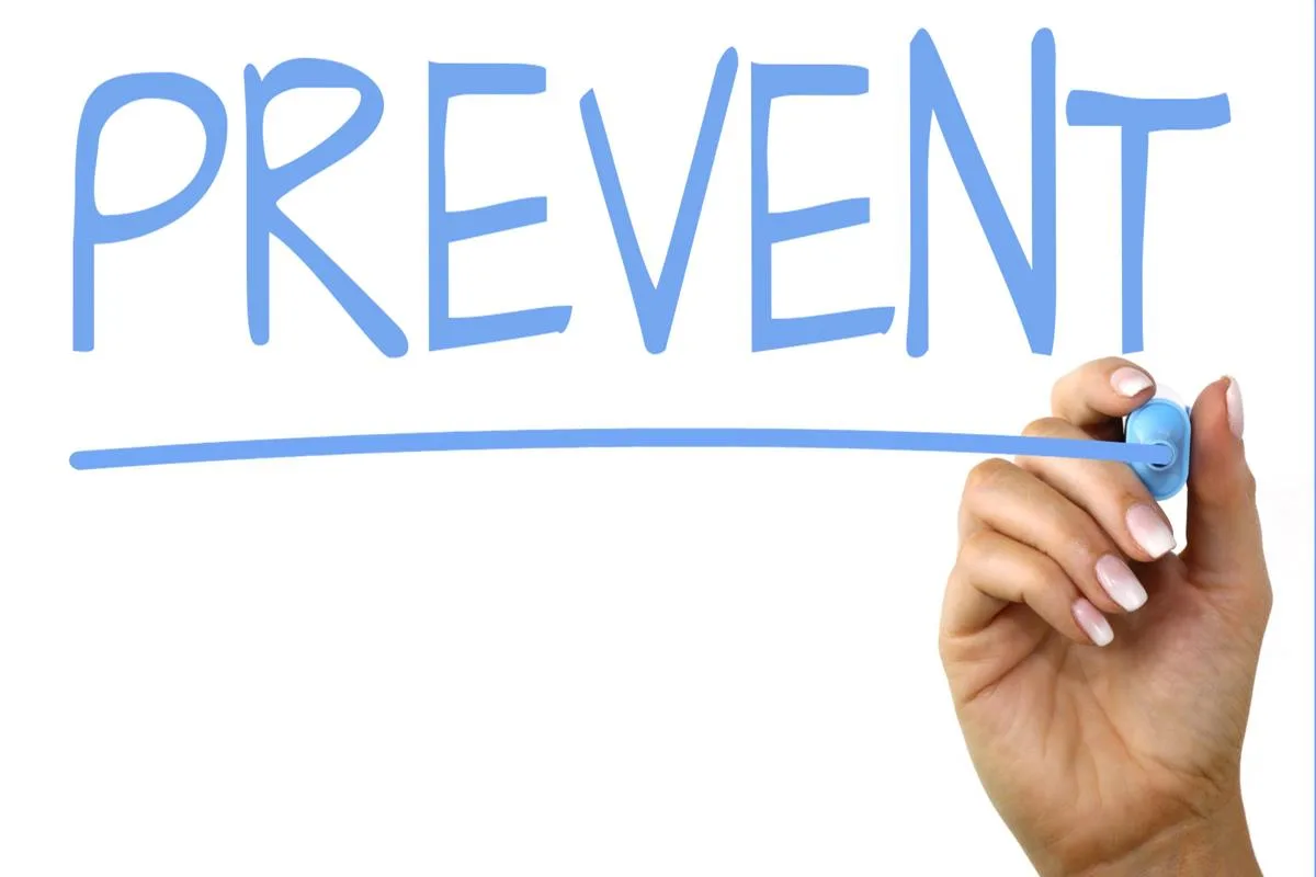 A women is writing prevent.